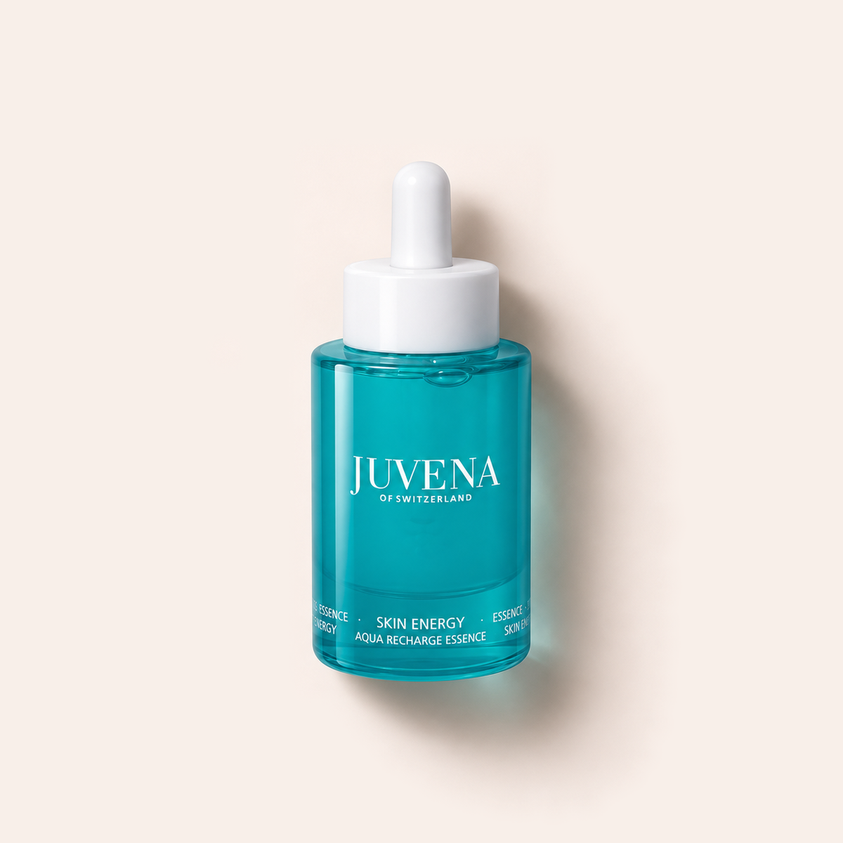 Pleťová esence Juvena Skin Energy Aqua Recharge Essence 50 ml na béžovém pozadí – MrRizz