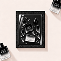 Parfemovy obraz Giorgio Armani Acqua di Giò Eau de Parfum Intense v cernem ramu - ilustracni fotografie