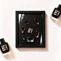 Parfemovy obraz Gentleman Society Eau de Parfum Ambrée Givenchy v cernem ramu - ilustracni fotografie