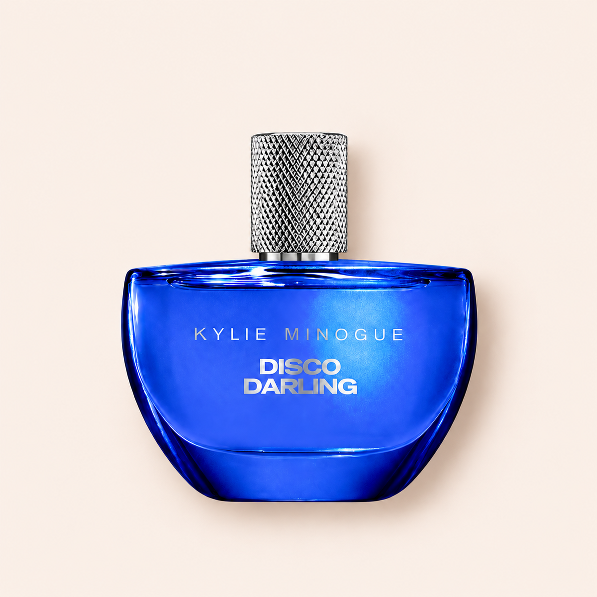 Flakon Kylie Minogue Disco Darling EDP 30 ml na béžovém pozadí – MrRizz